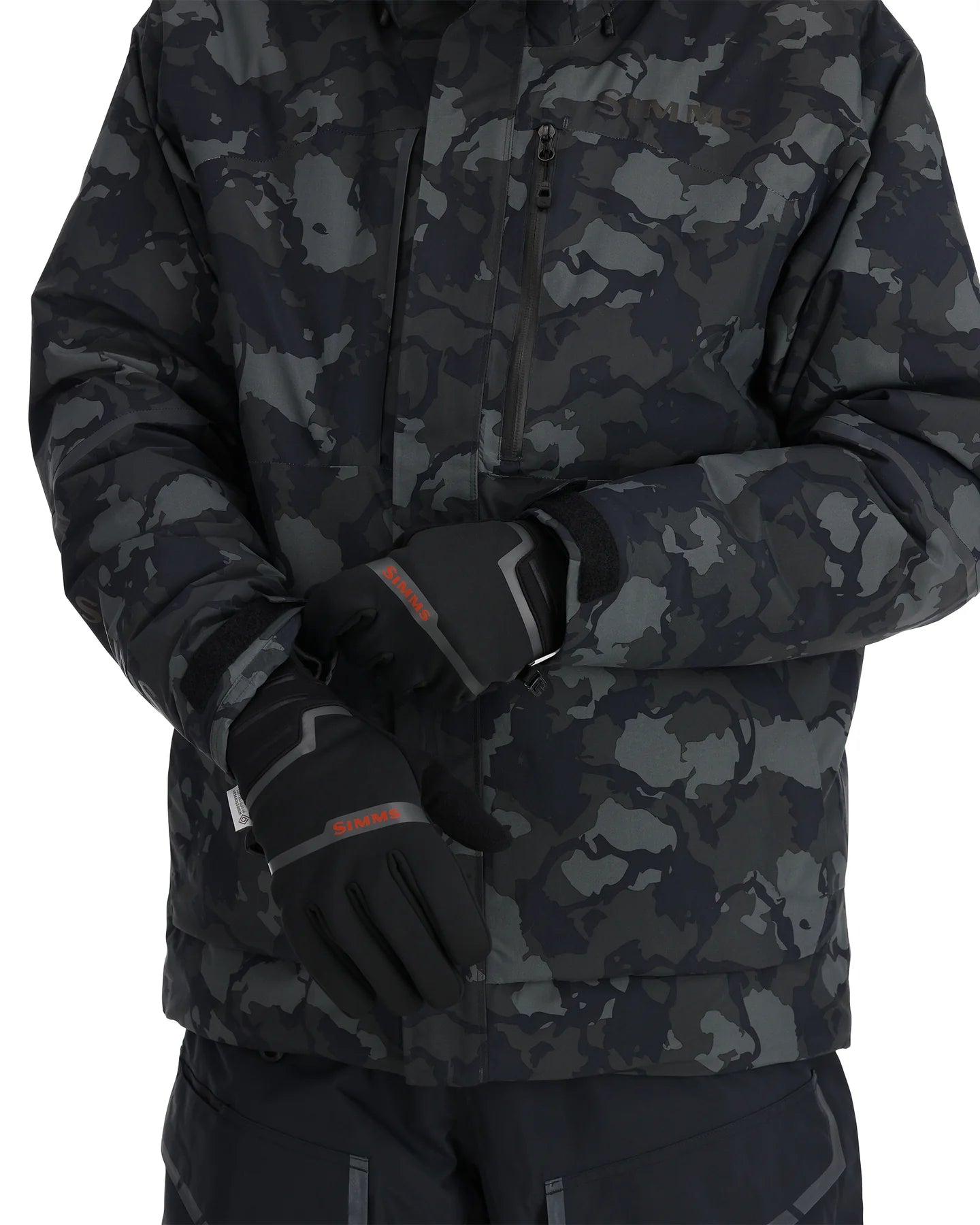 Person wearing a black camouflage jacket and gloves on a white background
