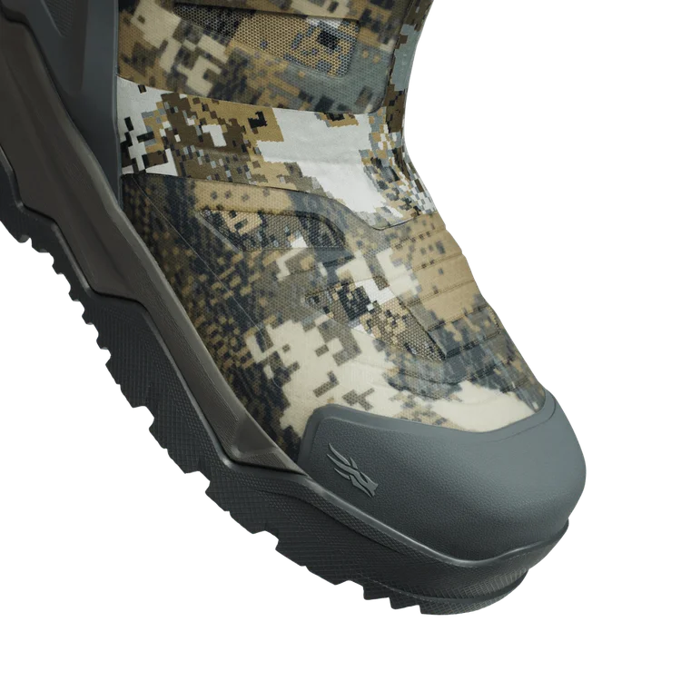 Camouflage boot with a black sole on a white background