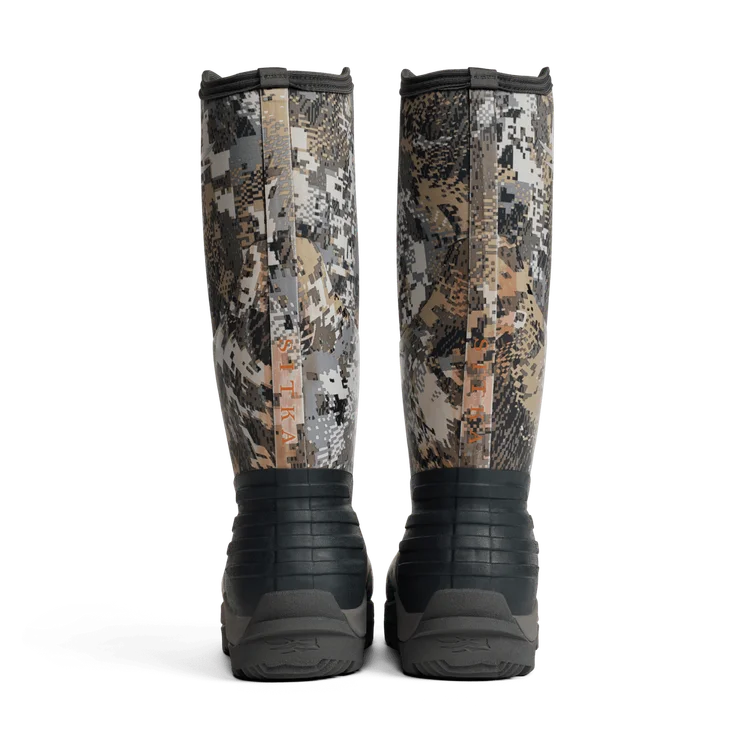 Pair of camouflage-patterned boots on a white background