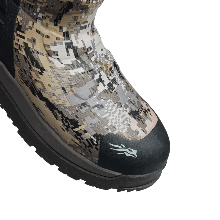 Camouflage boot with a black sole on a white background