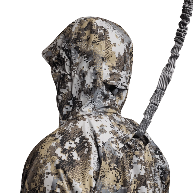 Camouflage hunting jacket with a hood on a white background
