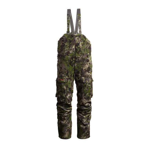 Camouflage hunting pants with suspenders on a white background