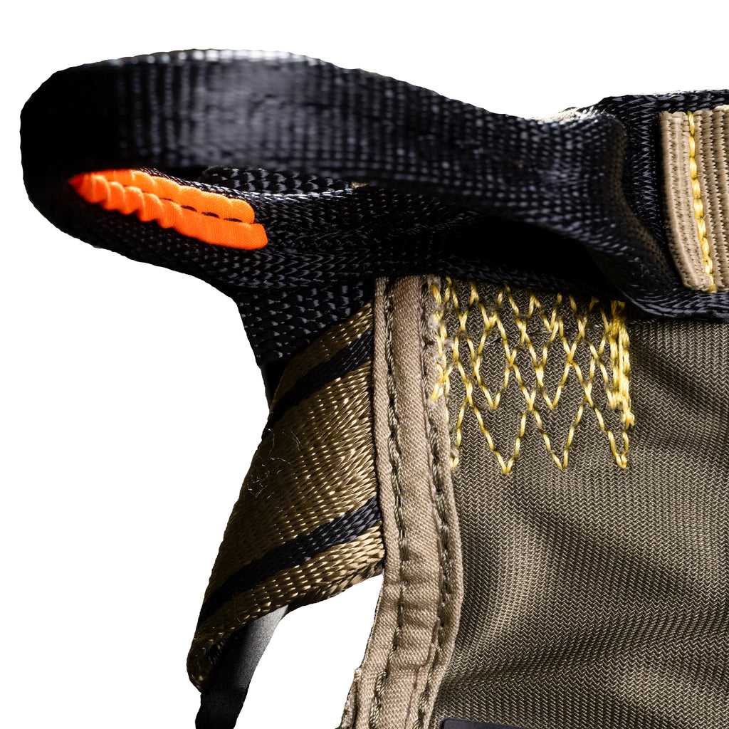 Close-up of a tactical belt with orange stitching on a white background
