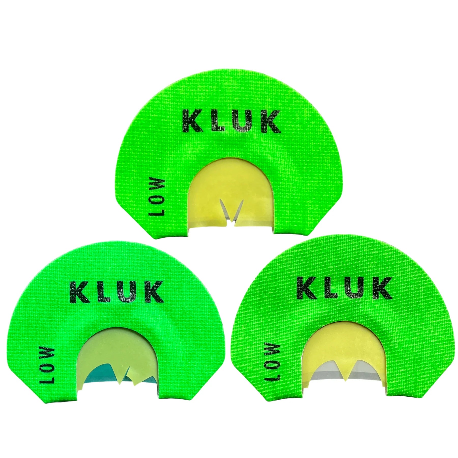 Three green KLUK hunting call devices on a white background
