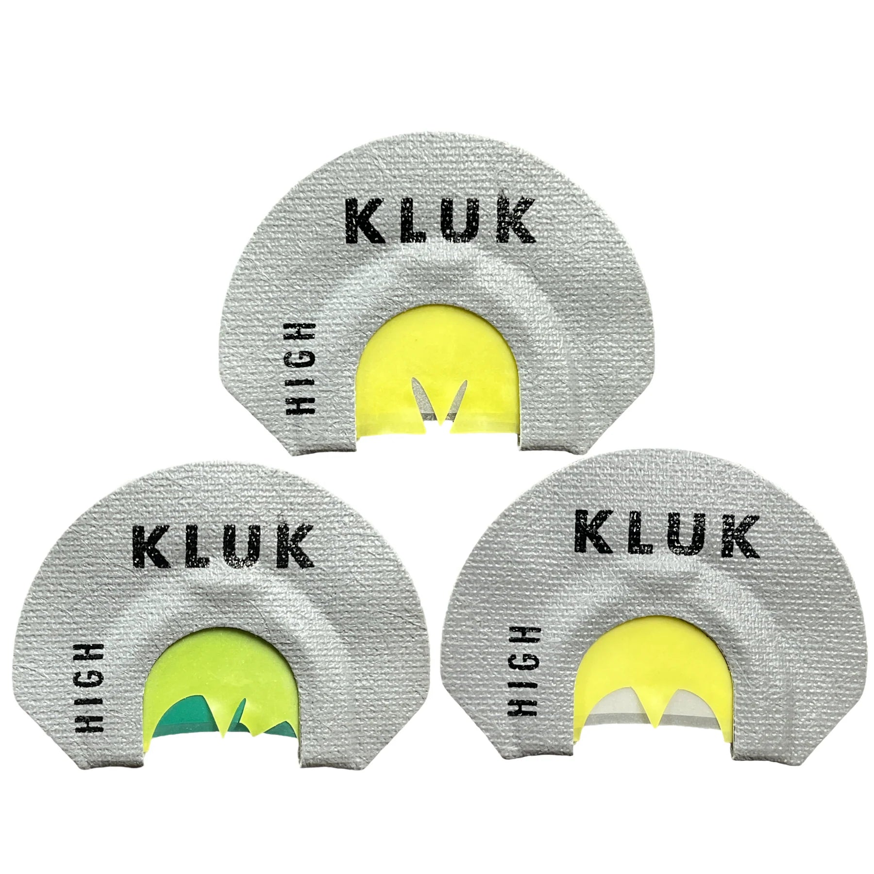 Three gray and yellow KLUK hunting call devices on a white background