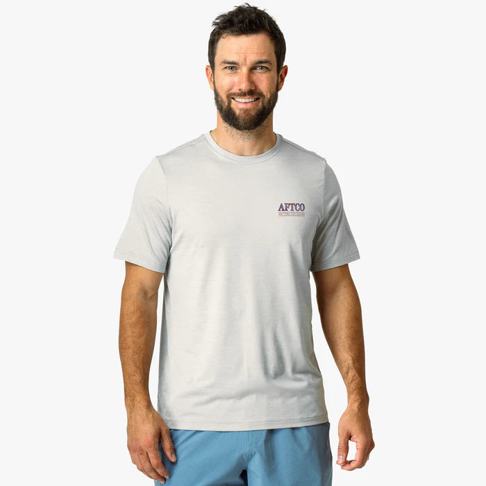 Man wearing white shirt with logo on a white background