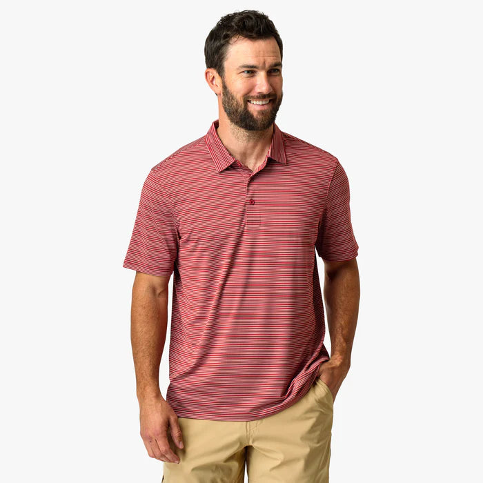 Man wearing red collared shirt with white stripes on a white background