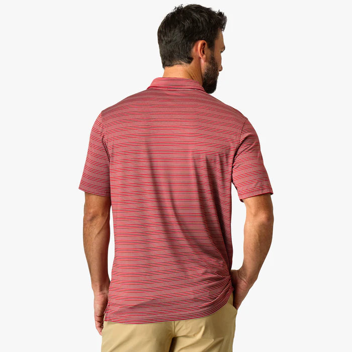 Man wearing a red striped polo shirt on a white background