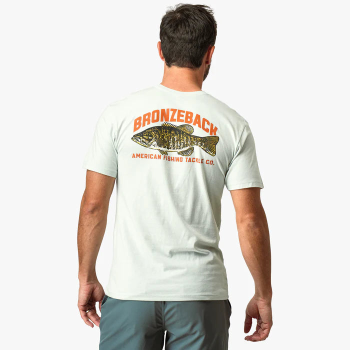 Man wearing a white t-shirt with 'Bronzeback American Fishing Tackle Co' logo on the back.