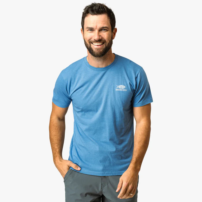 man wearing blue shirt on a white background