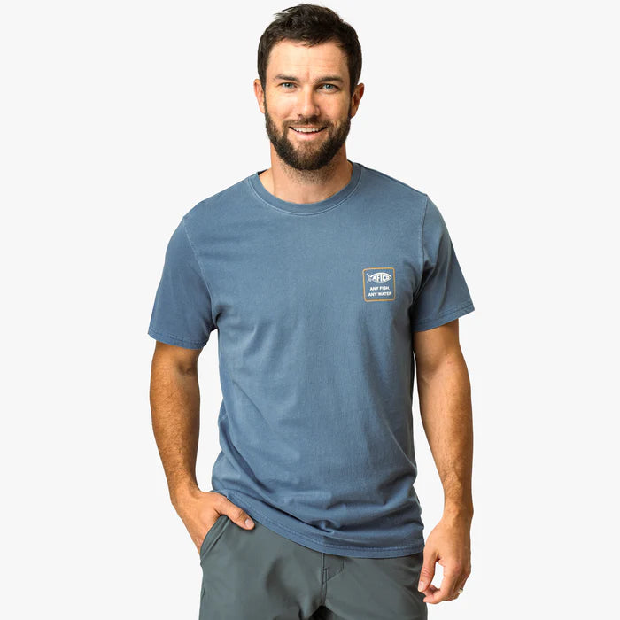 Man wearing blue shirt on a white background
