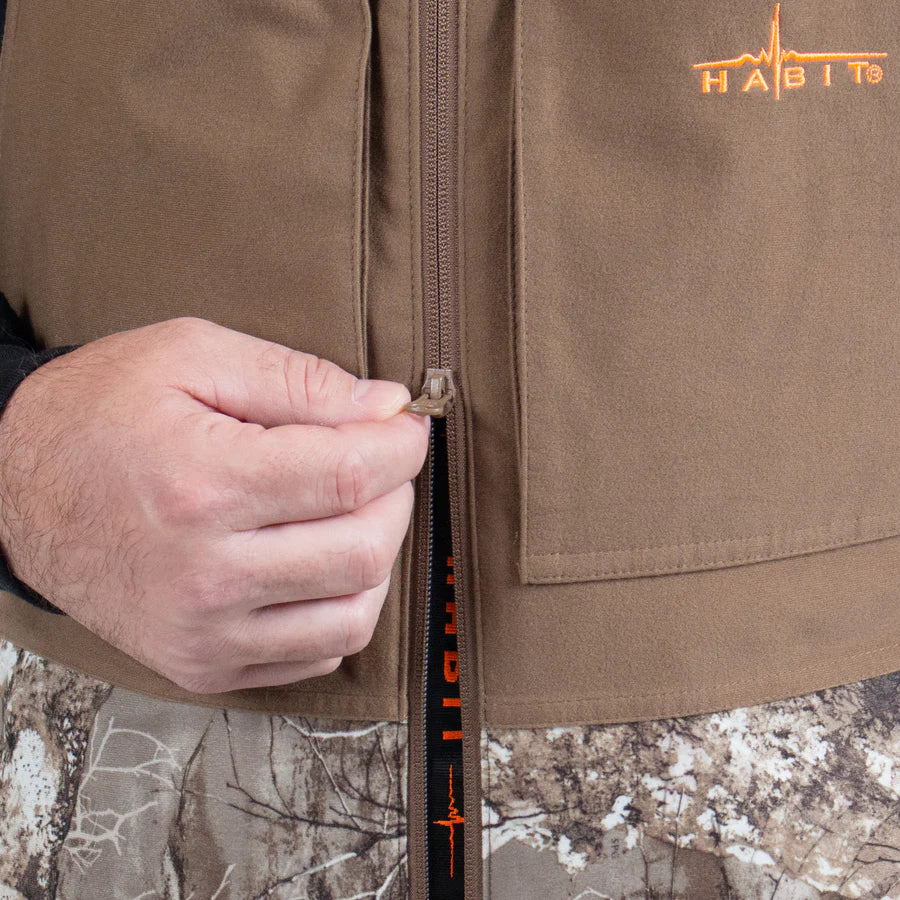 brown and camouflage jacket with visible brand logo and zipper
