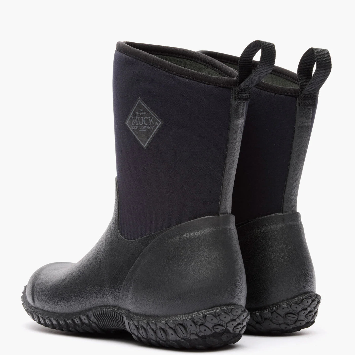 Pair of black rubber boots with Muck boot logo on a white background