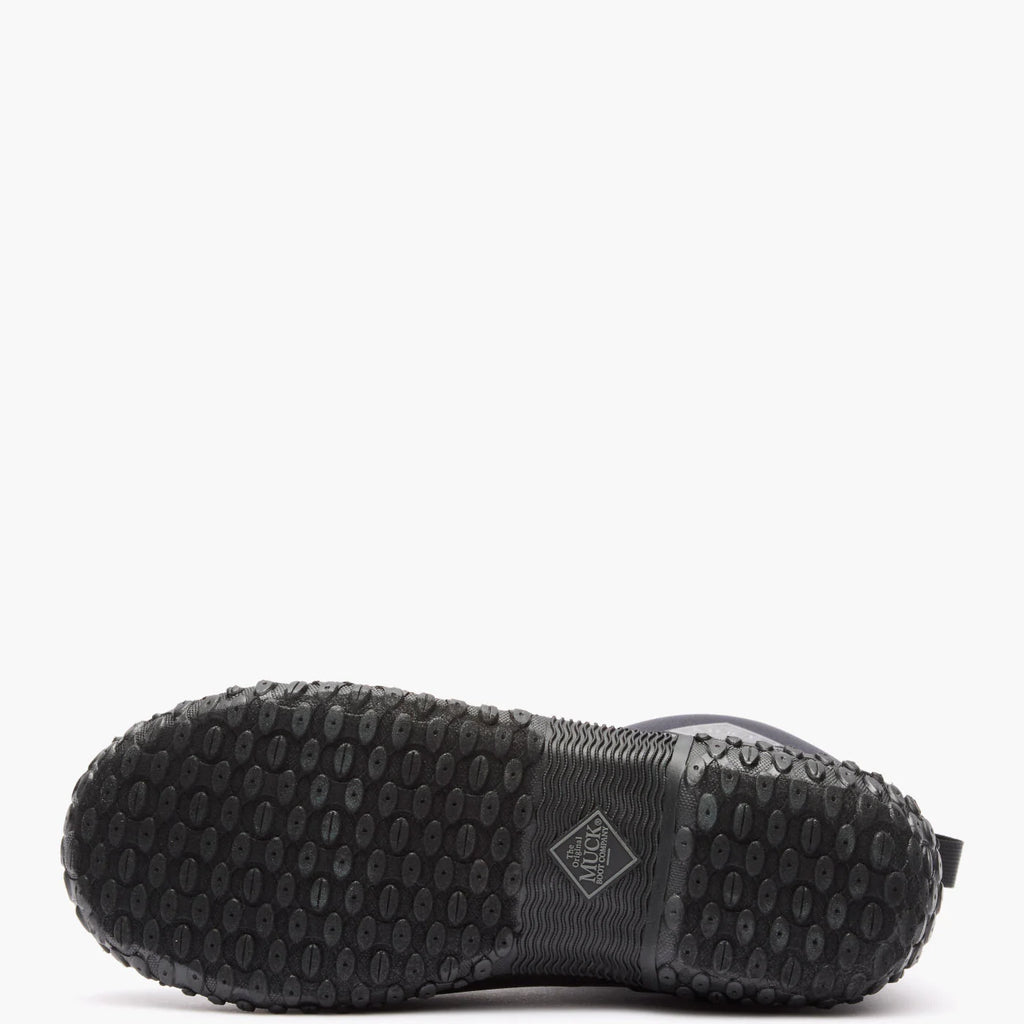 Black shoe with textured sole on a white background