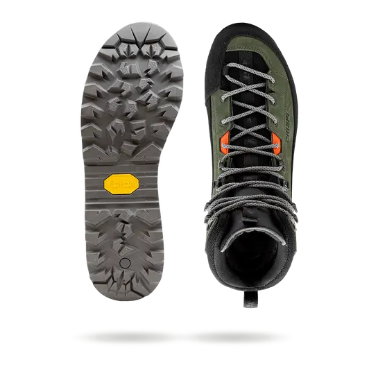 Hiking boot with sole showing tread pattern on a white background