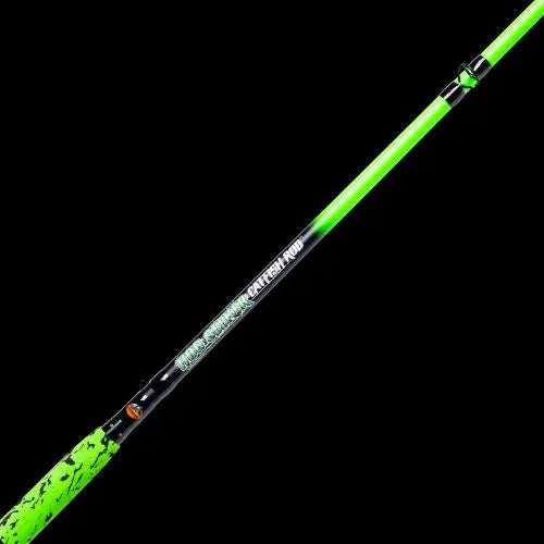 Green and black fishing rod on a black background