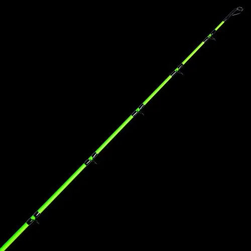 Green fishing rod on a black background