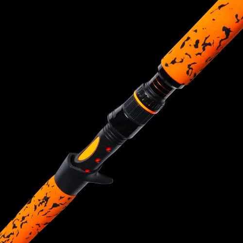 Orange and black fishing rod on a black background