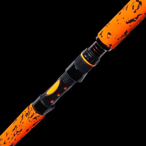 Orange and black fishing rod handle on a black background