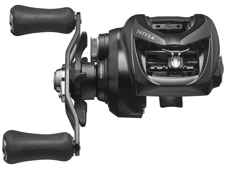 Black fishing reel with 'Tatula' branding on a white background