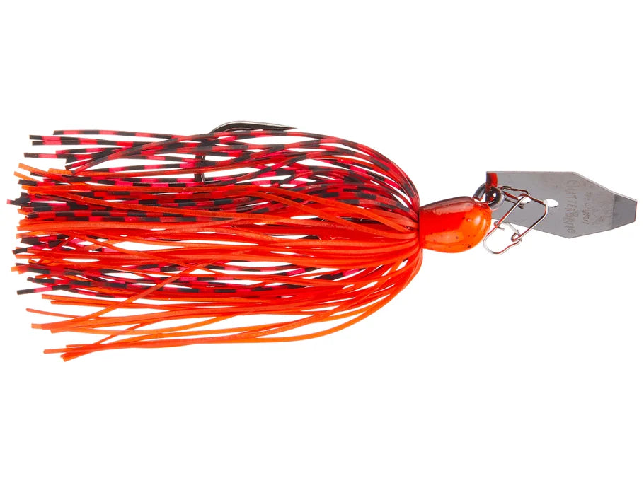 Fishing lure with orange and black skirt on a white background