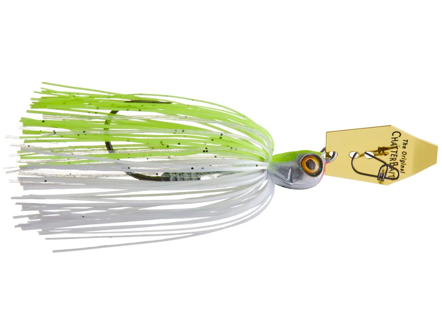 Fishing lure with green and white skirt on a white background