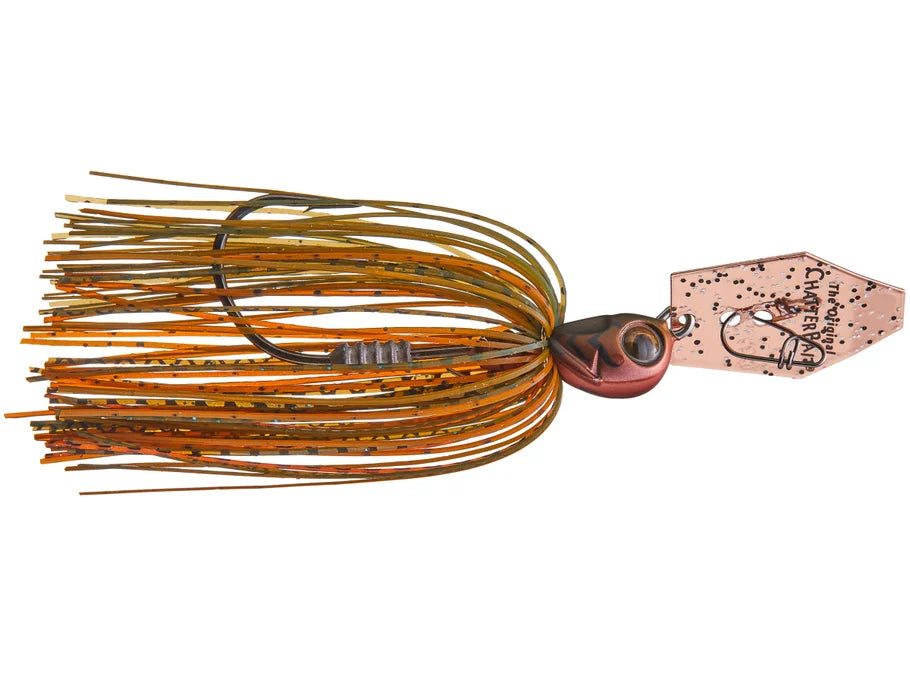 Fishing lure with orange and green skirt on a white background