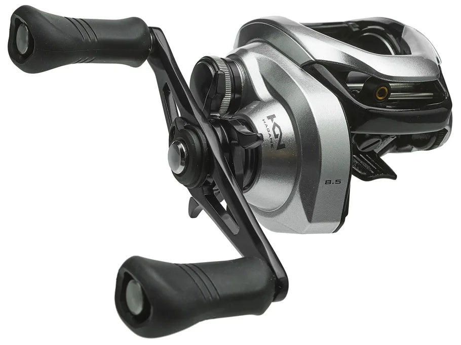 Fishing reel with black and silver design on a white background