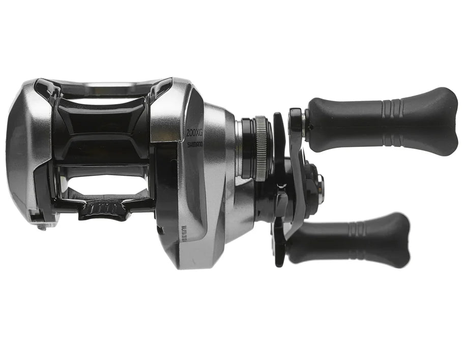Fishing reel with metallic body and black handles on a white background